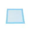 Blue-bordered white absorbent pad lies flat on a plain white background, showing its quilted inner surface.