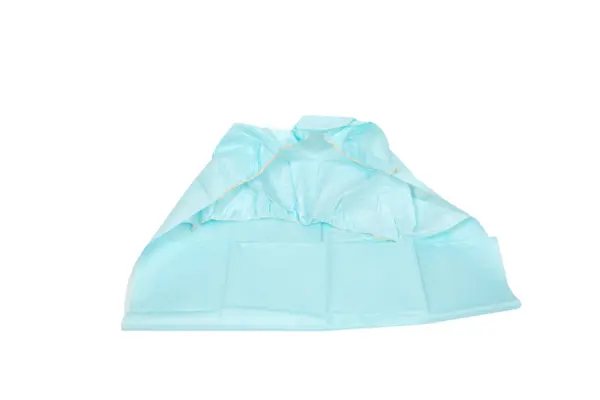 Light blue disposable elastic hair cover laid open on a white background, showing its gathered edge and thin material.