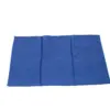 Folded blue fabric cloth on a white background Rectangular blue fabric cloth laid flat on a white background, with visible creases, stitched edges, and a soft texture.
