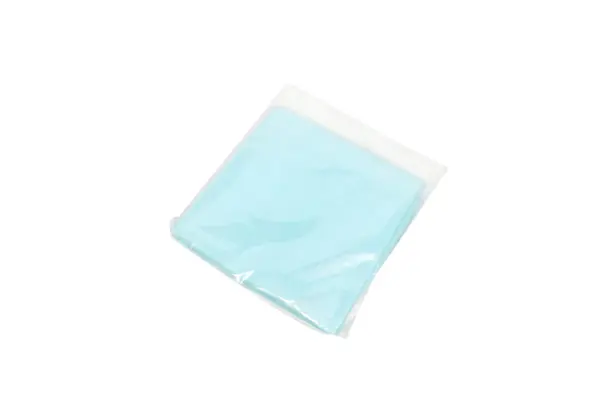 Light blue rectangular pad inside a transparent plastic sleeve, photographed against a plain white background.
