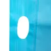 Close-up of blue textured fabric with white oval Blue textured material featuring a vertical stitched seam and a smooth white oval detail against a plain background