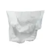 Crumpled white nonwoven protective cover with elasticated edges, isolated against a plain white background
