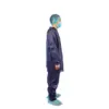 Healthcare worker wearing full protective equipment Side-profile healthcare worker wearing a blue protective gown, face mask, hair cover, gloves, and shoe covers