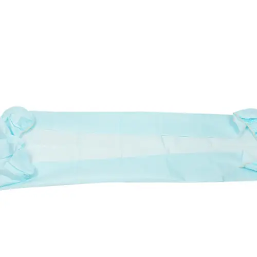 Light blue medical drape displayed on white Light blue disposable medical drape spread flat, with gathered folded ends and a long rectangular center panel.