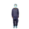 Medical worker wearing full protective coveralls Person wearing a dark protective coverall suit, blue hair cover, face mask, and disposable shoe covers against a white background