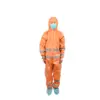 Person wearing orange protective coveralls and mask Person in an orange hooded protective coverall with reflective bands, blue face mask, and blue shoe covers