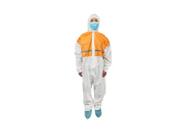 Worker in an orange and white protective coverall Person wearing an orange and white protective coverall, face mask, hood, and blue shoe covers against a white background.