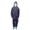 Front view of person in navy protective coveralls Person standing in navy hooded protective coveralls, blue face mask, hair cover, and disposable shoe covers on white background.