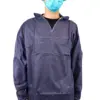 Person wearing a protective gown and face mask Person shown from the shoulders down wearing a dark blue disposable protective gown and light blue surgical face mask.