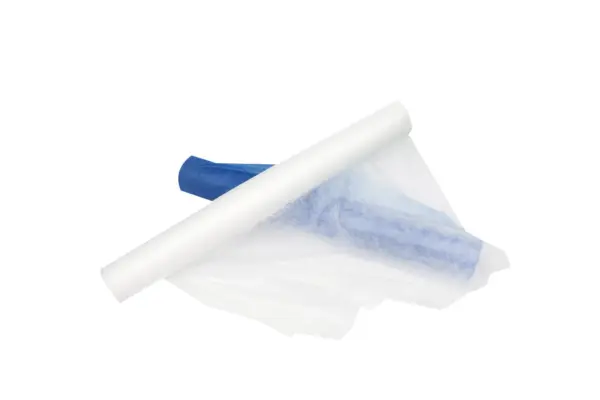 Two rolls of lightweight fabric, one white and one blue, shown partly unrolled with translucent white material spread out.