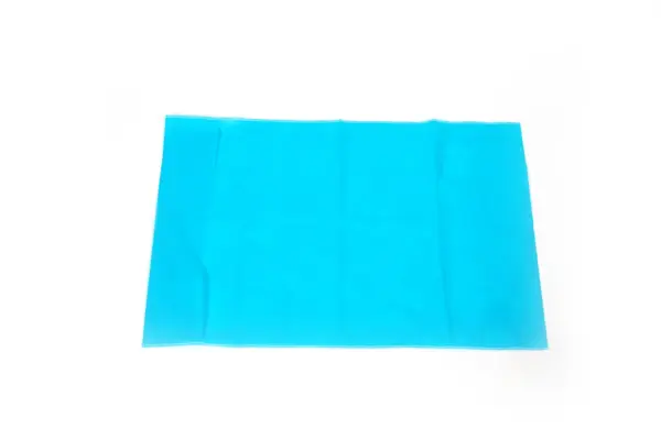 Turquoise fabric panel displayed on a white background Bright turquoise rectangular fabric panel with stitched edges, laid flat against a plain white background.