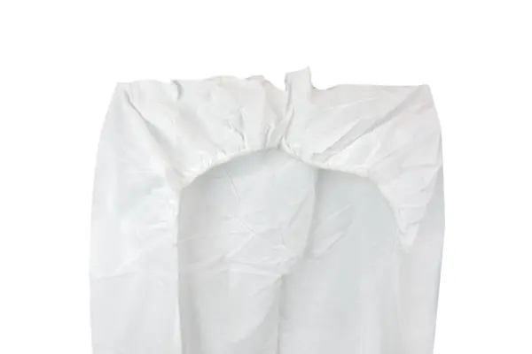 White disposable protective coverall with a gathered hood and long sleeves, displayed flat against a plain background.