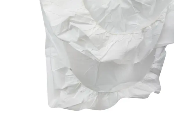 Close-up of a white crinkled protective cover featuring two large elasticated circular openings and gathered edges.
