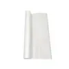 White sheet of paper partially unrolled from a narrow roll against a plain white background