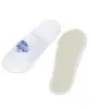 Pair of white open-back slip-on slippers, with one showing a blue printed design and the other revealing its sole.